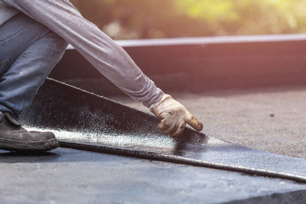 Professional Basement Waterproofing technician working in Arlington, WI